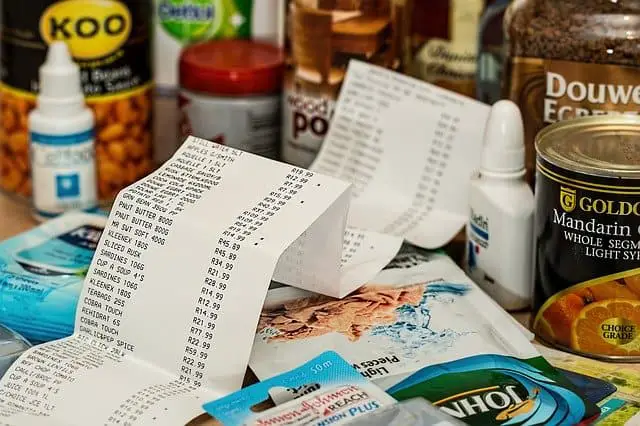 save money on food - a long grocery receipt and food