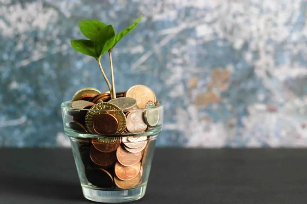 jar of coins savings rainy day fund vs emergency fund