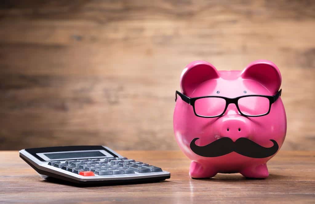 Pink Piggybank And Calculator