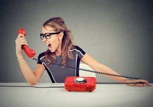 young woman yelling at phone work from home job