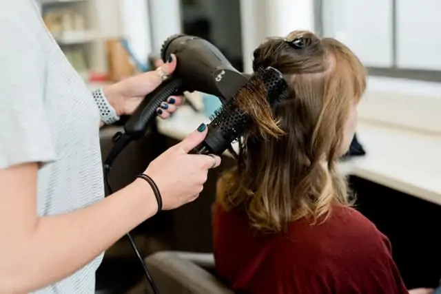 hairdresser blowdrying hair worst jobs for introverts