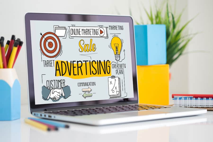 laptop showing make money advertising for companies