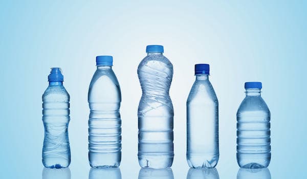 different plastic bottles of water